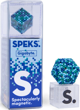 SPEKS Pixel Gigabyte, a colorful magnetic construction kit displayed in its packaging. The kit features a cluster of multicolored spheres arranged in a geometric shape beside a clear base, promoting creativity and tactile play.