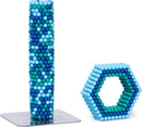 The Speks Pixel Gigabyte is a colorful fidget toy made of magnetic balls in shades of blue and green, displayed in two main shapes: a stacked column and a hexagonal structure on a metallic base, perfect for stress relief and creativity.