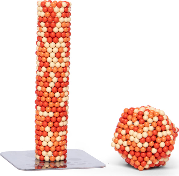The Speks Pixel 1 Up is an engaging fidget toy featuring colorful magnetic balls that can be arranged to create various shapes and structures. The set includes a tall, cylindrical stack and a geometric shape, encouraging creativity and fine motor skills development.
