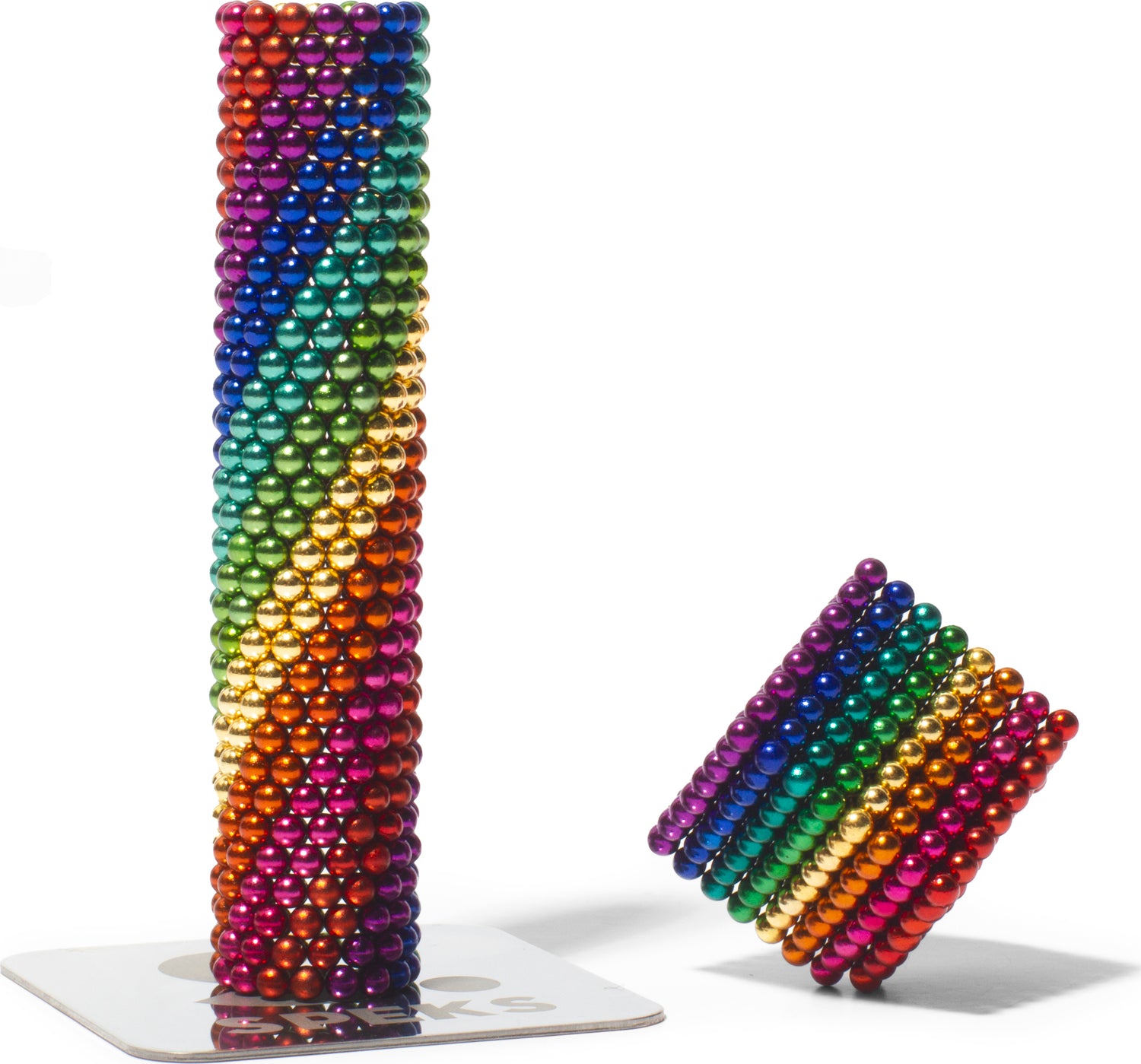 The Speks Spectrum features vibrant magnetic balls in a rainbow gradient, with one stack standing tall and another cluster forming a square shape. Perfect for creative designs and stress relief.