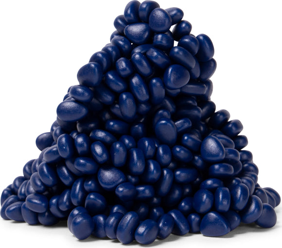 A close-up view of a pile of matte indigo-colored pebbles made from a soft, pliable material. The glossy texture and vibrant dark blue hue create an aesthetically pleasing visual, perfect for relaxation and fidgeting.
