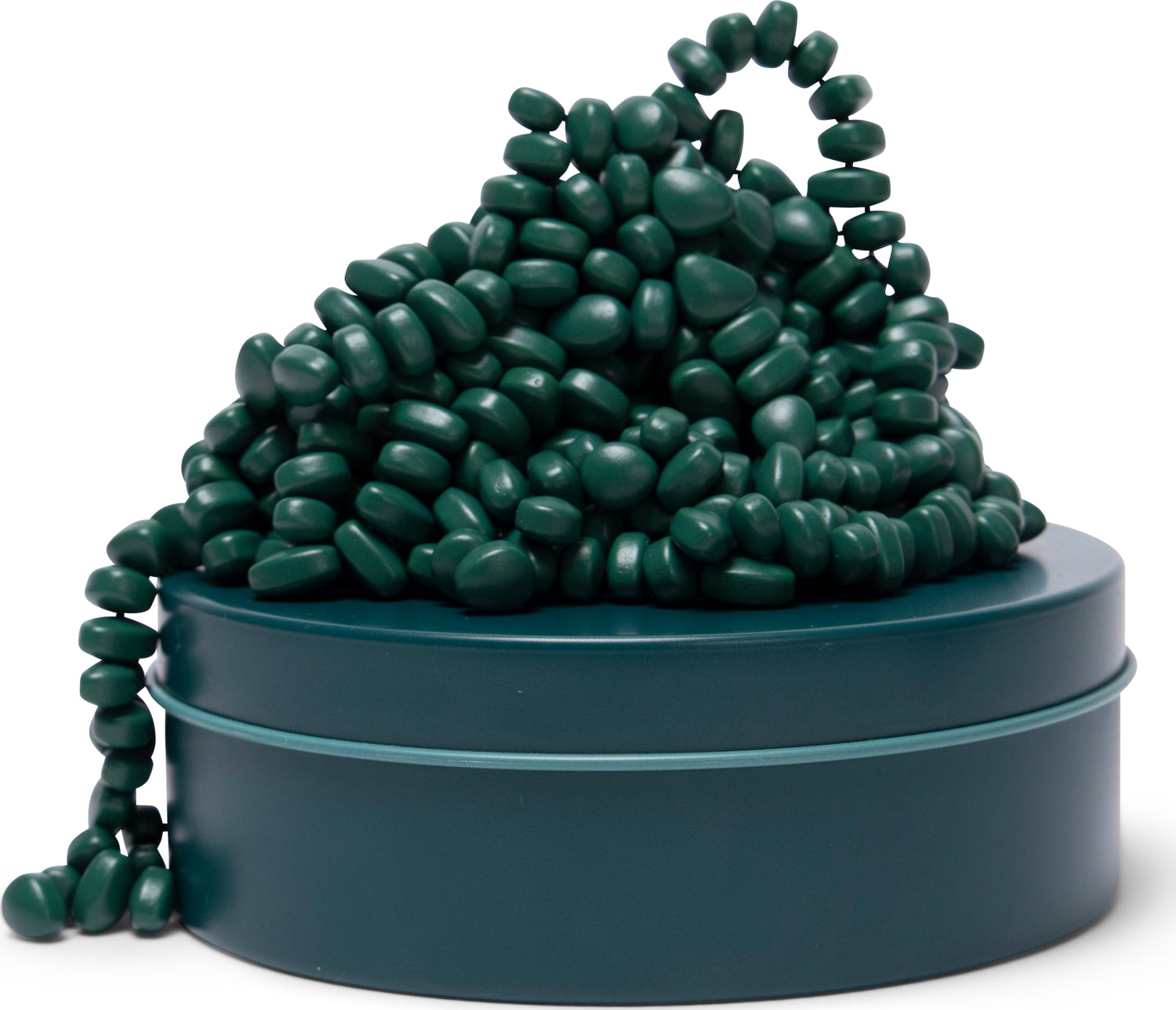 Crags Matte: Jade by SPEKS is a soothing fidget toy featuring a collection of smooth, matte jade-green beads piled on top of a round tin. The beads vary in shape and size, inviting tactile exploration and stress relief. Perfect for users seeking a calming activity, it combines aesthetic appeal with sensory engagement.