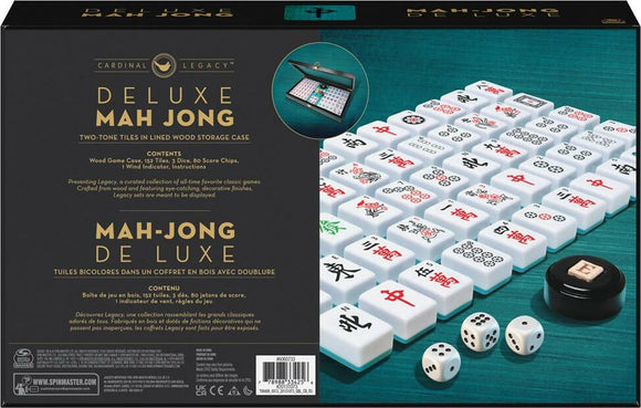 Deluxe Mahjong set from Cardinal Games featuring two-tone tiles arranged on a teal surface. The image shows the game box, containing 152 tiles, dice, score chips, and instructions, all housed in a lined wooden storage case for an elegant presentation.
