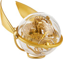 The Harry Potter Perplexus Golden Snitch is a mechanical puzzle designed by Spin Master. It features intricate pathways within a transparent sphere, adorned with elegant golden wings. This unique puzzle challenges players to navigate a small ball through twists and turns, simulating the experience of capturing the elusive Golden Snitch from the Harry Potter universe.