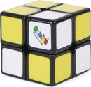 The Rubik's 2x2 Apprentice puzzle features a compact design with vibrant yellow, white, and black squares. It's a mechanical puzzle that challenges users to align all colors on each side, enhancing cognitive skills and providing hours of entertainment.