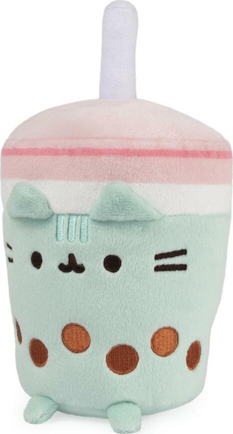 Adorable plush toy resembling a cup of boba tea, featuring Pusheen's signature cat design. The plush is mint green with a pink lid and a white straw, decorated with brown boba beads. Soft and cuddly, perfect for Pusheen fans and as a cute home decor piece.