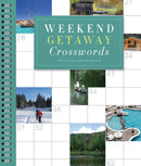 The 'Weekend Getaway Crosswords' book edited by Leslie Billig features a spiral binding and showcases picturesque images of vacation spots including snowy landscapes, a serene lake, and a luxurious pool. It invites readers to engage in crossword puzzles themed around relaxing weekend getaways.