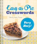 A book titled 'Very Easy! Easy as Pie Crosswords' edited by Stanley Newman. The cover features a cross-section of a pie on a white plate against a background of crossword puzzle squares.