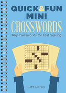 Cover of the book 'Quick & Fun Mini Crosswords' by Matt Gaffney, featuring a light blue background, spiral binding, and an illustration of hands holding a crossword puzzle grid with visible clues and filled squares, emphasizing tiny crosswords designed for quick solving.