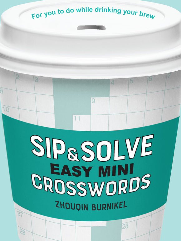 Close-up of a coffee cup featuring the title 'Sip & Solve Easy Mini Crosswords' by Zhouqin Burnikel. The cup is decorated with crossword grids and a stylish turquoise design, indicating it's a fun activity to enjoy while sipping your favorite beverage.