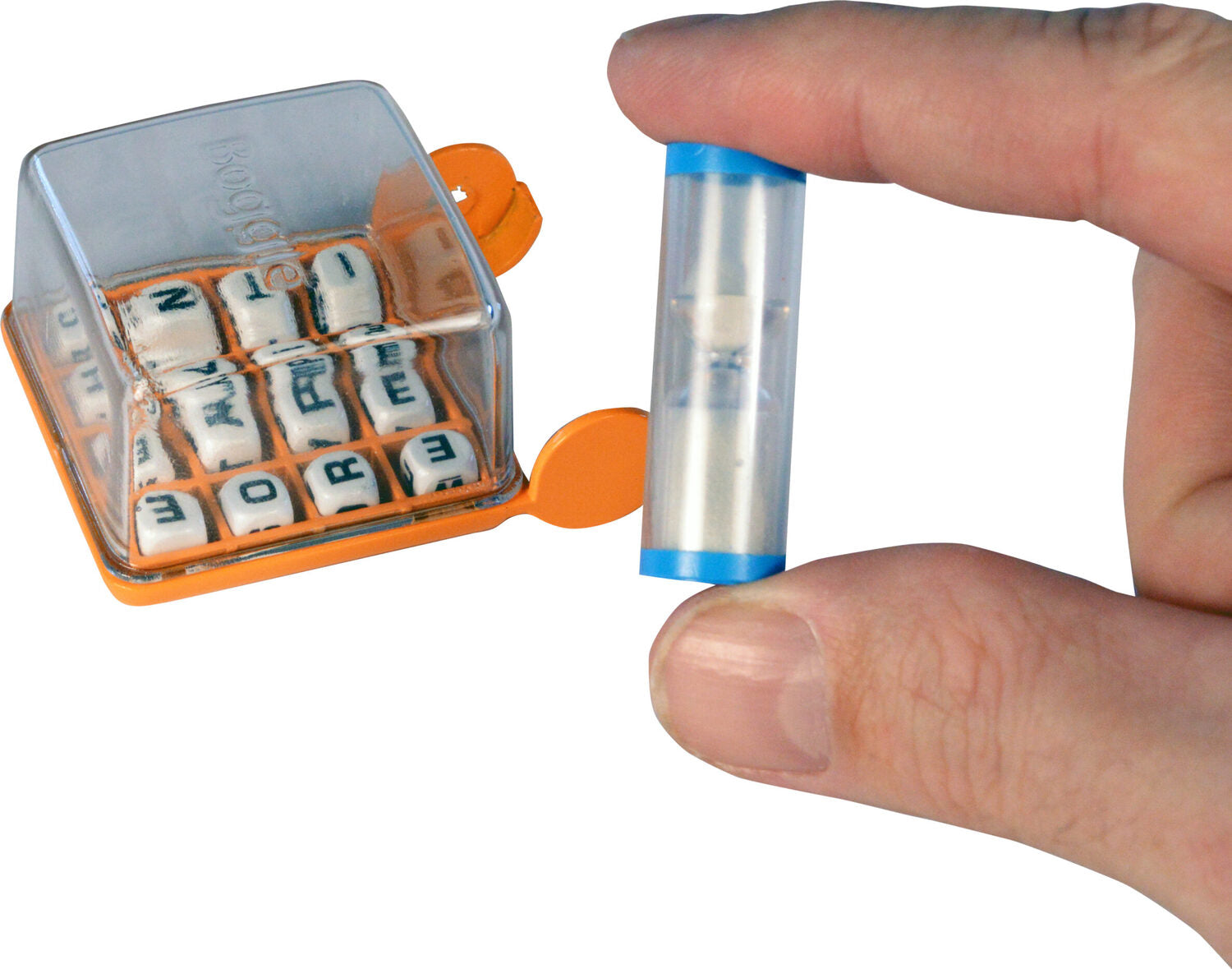 World's Smallest Boggle game by Super Impulse, featuring a compact clear case with orange accents. The game contains lettered dice and a small hourglass timer for gameplay.