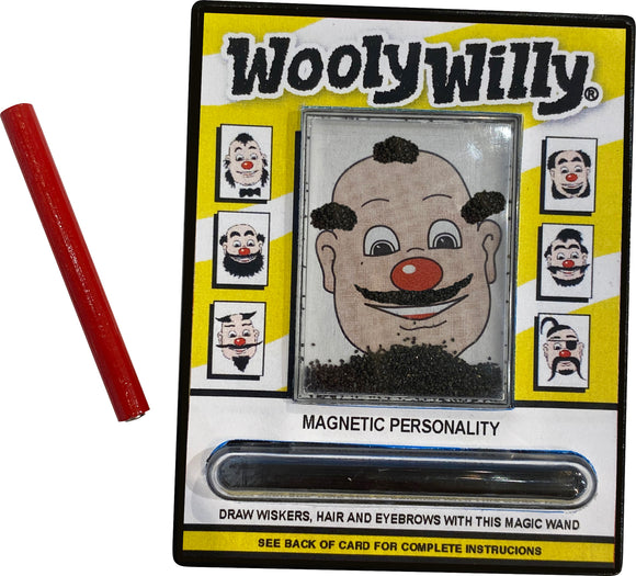 The World's Smallest WoolyWilly by Super Impulse features a playful clown face where users can create funny hairstyles and facial features using magnetic iron filings and a red magic wand. The colorful packaging displays various faces and instructions for creating unique looks, making it a fun and engaging fidget toy.