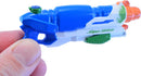 A person holding the World's Smallest Super Soaker by Super Impulse. The mini water gun features a blue body with green and orange accents, designed for fun and play.