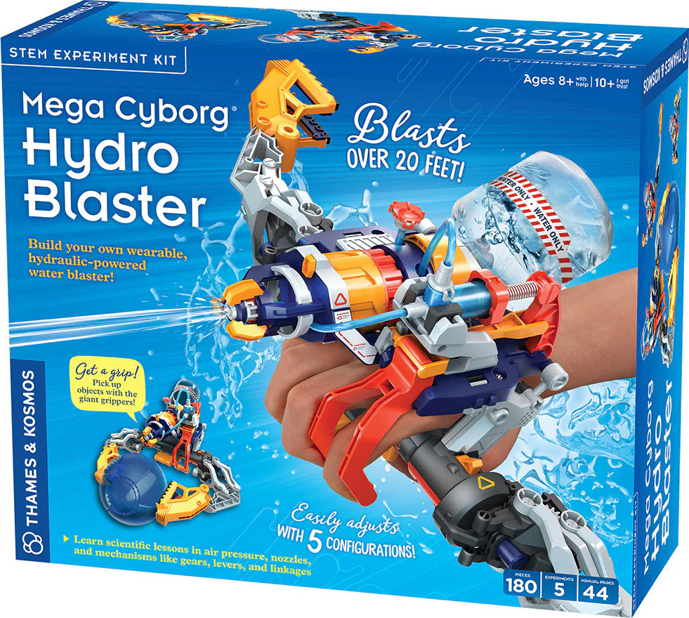 The Mega Cyborg Hydro Blaster, a STEM experiment kit by Thames & Kosmos, showcases a colorful hydraulic-powered water blaster worn on a hand. Features include a gripping mechanism and various components for building. The box highlights its ability to blast water over 20 feet and promotes learning about air pressure and mechanical systems.