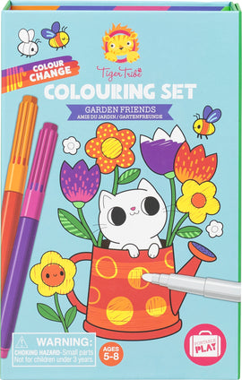 The Colour Change Coloring Set by Tiger Tribe features a vibrant cover with a playful illustration of a cute white cat sitting inside a red watering can surrounded by colorful flowers. The set includes color-changing markers, designed for children aged 5-8, perfect for creative play and artistic expression.
