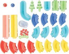 The Waterslide Marble Run by Tiger Tribe features colorful pieces including curved tracks, trees, and marbles. This engaging set encourages creativity and fine motor skills.