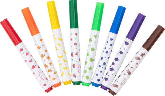 Set of vibrant scented markers by Tiger Tribe. The markers are arranged in a row and feature a variety of fruity designs on their surfaces. Colors include red, orange, yellow, green, blue, purple, and brown, each with a distinctive scent inspired by fruits and treats.