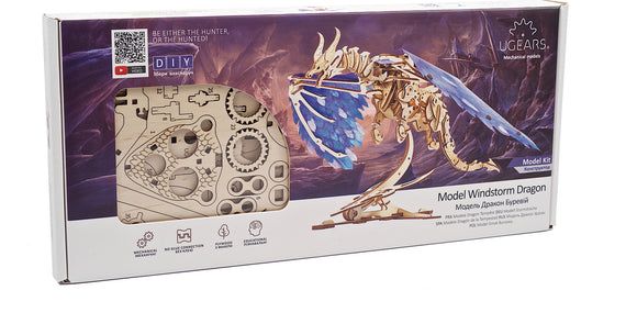UGears 3D Windstorm Dragon DIY kit box featuring intricately designed wooden puzzle pieces and a stunning dragon model with blue wings. The packaging showcases educational benefits and highlights the no-glue assembly process.