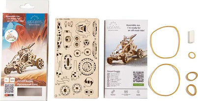 Ugears 3D Mini Desert Buggy DIY kit featuring intricate wooden components, a detailed instruction booklet, and rubber bands for assembly. The kit showcases a mini desert buggy design that assembles into a mechanical model, ideal for hobbyists and DIY enthusiasts.