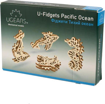 U-Fidgets Pacific Ocean DIY kit by Ugears. This set includes intricately designed mechanical models resembling ocean creatures such as fish and seahorses. The wooden pieces are crafted to showcase detailed patterns, perfect for enhancing creativity and dexterity. Ideal for both children and adults who enjoy building and fidgeting.