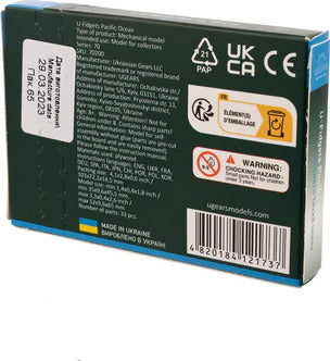 The Ugears U-Fidgets Pacific Ocean, a DIY mechanical model kit designed for hands-on creativity. This engaging model features intricate pieces perfect for assembling a decorative ocean-themed display. Packaged in a compact box, it showcases the brand's logo and necessary product information, promoting learning and fun.