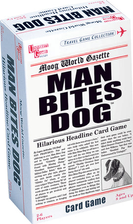 Man Bites Dog card game by University Games. The box features a newspaper-like design with bold text that reads 'MAN BITES DOG' and 'Hilarious Headline Card Game'. Suitable for 2-6 players aged 8 and up, it is part of the Travel Game Collection.