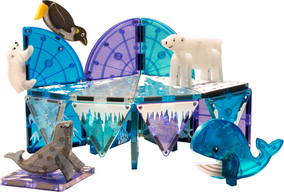 A colorful Arctic themed DIY kit featuring 25 magnetic tiles from Magna Tiles. The scene includes a polar bear, a seal, a whale, and a penguin, on a blue and transparent ice platform decorated with icy graphics. The interactive pieces encourage imaginative play and learning about Arctic animals.