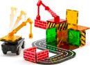 Magna Tiles Builder 32 Piece Set featuring colorful translucent building tiles and construction pieces. Includes a truck base with a moving crane, road tracks, and various building structures to inspire creativity and engineering skills.