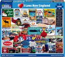 The packaging of the 'I Love New England' jigsaw puzzle by White Mountain Puzzles features a colorful collage of iconic New England imagery, including signs and landmarks from Cape Cod, Martha's Vineyard, and more. The design showcases various local specialties, like lobster and chowder, alongside festive graphics representing the region's culture and history. This 1000-piece puzzle is designed for puzzle enthusiasts who adore the charm of New England.