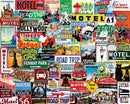 A colorful collage of vintage road trip signs, including 'Motel', 'Road Trip', 'Las Vegas', and various destinations like 'Hollywood', 'Niagara Falls', and 'Grand Canyon'. The jigsaw puzzle features charming illustrations of cars, iconic landmarks, and retro advertisements, capturing the essence of American travel and adventure.