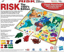 Risk 1980's Edition board game by Winning Moves. The game features a world map in retro 1980s style with colorful plastic army pieces in red, yellow, green, and blue. Includes dice and a rules booklet for gameplay. Perfect for strategic fun and competitive play.