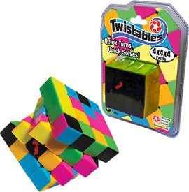Twistables 4x4x4 mechanical puzzle by Winning Moves displayed with a colorful, interlocking design featuring bright squares in green, yellow, pink, and black. The product packaging showcases the puzzle's title and boasts phrases like 'Quick Turns Quick Solves!'