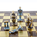 A Cycladic Art Chess Set by Manopoulous featuring unique figurine chess pieces inspired by ancient Greek culture. The chessboard has a glossy finish with contrasting tiles, showcasing the artistic deign of the characters.