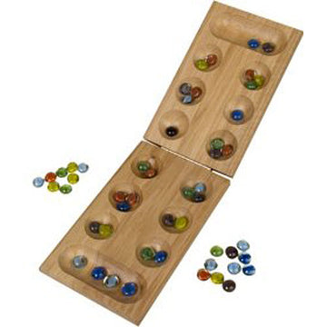 A wooden Mancala game set laid open, featuring a smooth, rectangular board with two rows of pits for marbles. Colorful glass marbles in various shades are scattered around the board, showing vibrant hues of blue, green, amber, and more. The set is neatly arranged for gameplay, evoking a sense of strategy and fun.
