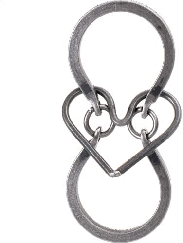 A close-up image of the Captive Heart Tavern Puzzle by Tucker Jones House. The puzzle features a unique mechanical design with intertwined loops creating an intriguing, heart-shaped visual. Made of polished metal, the puzzle is both decorative and challenging, inviting users to figure out the solution while appreciating its artistic craftsmanship.