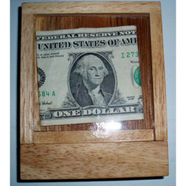 Cash Out! is a mechanical puzzle featuring a secure wooden box with a transparent front displaying a one dollar bill inside. The puzzle challenges users to figure out how to retrieve the money without damaging the box. Ideal for puzzle enthusiasts and gift-givers looking for a unique and engaging challenge.