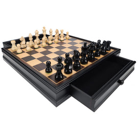 A premium 3.5-inch chess set featuring a beautifully crafted black and natural wood board. The set includes intricately designed black and white chess pieces neatly arranged on the board, with a spacious drawer for storage beneath. Perfect for chess enthusiasts and collectors.