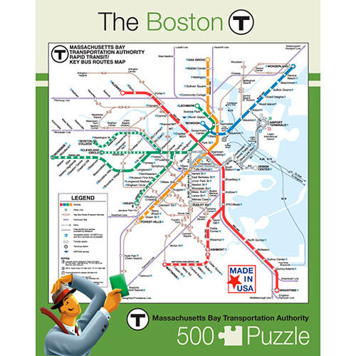 A 500-piece jigsaw puzzle featuring a detailed map of the Boston T transportation system, highlighting subway and bus routes with colorful lines. The design includes a legend for easy navigation and is made in the USA by New York Puzzle Company. The background is light with a playful character holding a puzzle piece, set against the map layout.