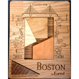 Boston by Eureka! is a beautifully crafted mechanical puzzle featuring a laser-etched wooden base depicting the iconic Leonard Zakim Bridge and skyline of Boston. The puzzle is made of various wood pieces in warm hues, designed to challenge users in a creative and engaging way. Perfect for puzzle enthusiasts and as a decorative piece.