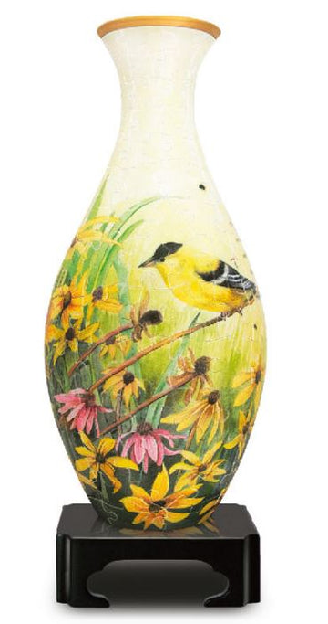 A beautifully designed 3D jigsaw puzzle vase featuring a vibrant yellow goldfinch perched on a branch among colorful flowers, set atop a sleek black base. The vase design captures the essence of nature with intricate details, making it a perfect decorative piece once assembled.