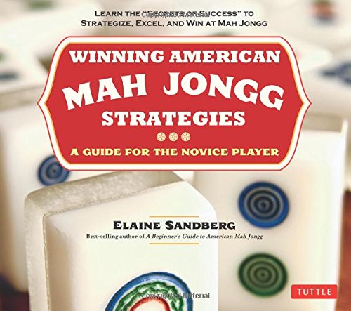 Book cover of 'Winning American Mah Jongg' by Elaine Sandberg. Features vibrant red and white text with a subtitle that reads 'A Guide for the Novice Player'. The background displays traditional Mah Jongg tiles, including circular designs, showcasing the game's colorful elements.