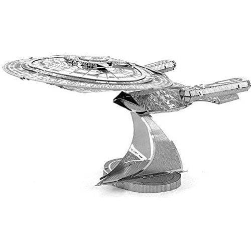 A detailed metal model of the USS Enterprise, featuring intricate design elements and a sleek finish. The model is depicted on a sturdy base, showcasing its iconic starship shape with visible panels and mechanical details, perfect for collectors and DIY enthusiasts.