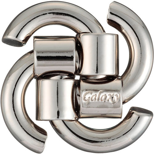 The Cast Galaxy puzzle by Hanayama is a beautifully designed mechanical puzzle featuring interconnected metal pieces that form a stylish and intricate shape. The shiny silver finish reflects light, adding an elegant touch. This puzzle challenges problem-solving skills and provides an engaging tactile experience.