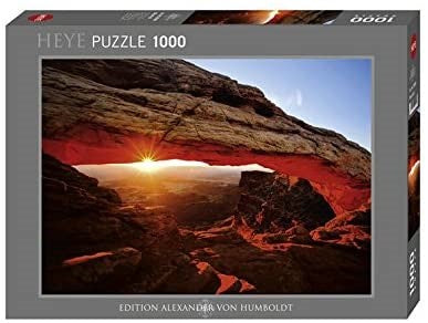 Mesa Arch jigsaw puzzle by Tomas Kaspar, featuring a stunning image of a picturesque arch at sunset. The box showcases vibrant colors and intricate details, perfect for puzzle enthusiasts. Contains 1000 pieces for an engaging challenge.