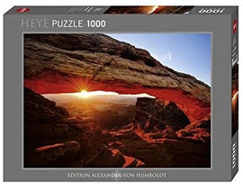 Mesa Arch jigsaw puzzle by Tomas Kaspar, featuring a stunning image of a picturesque arch at sunset. The box showcases vibrant colors and intricate details, perfect for puzzle enthusiasts. Contains 1000 pieces for an engaging challenge.