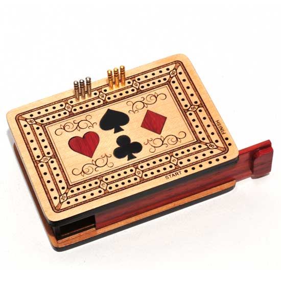 Inlaid wooden travel Cribbage board by R. Expo featuring classic game design with playing card suit symbols and scoring pegs. Compact and perfect for travel.