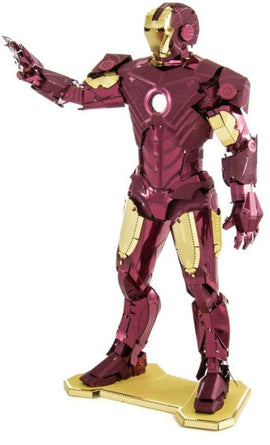 Metal Earth Iron Man model in vibrant colors, featuring intricate metal detailing. The figure stands with one hand raised in a 'repulsor blast' pose, showcasing a mix of gold and burgundy metallic finishes, mounted on a gold base.