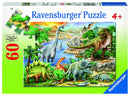A colorful jigsaw puzzle featuring a prehistoric scene with various dinosaurs in a lush landscape. The puzzle includes 60 pieces, showcasing dinosaurs like the T-Rex, Triceratops, and long-necked Brontosaurus, surrounded by vibrant foliage, water, and mountains, suitable for ages 4 and up.