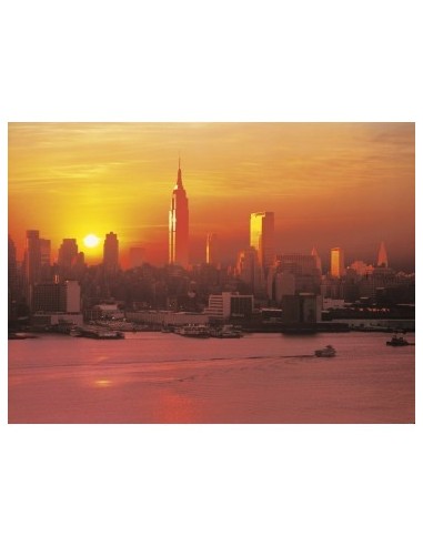 Clementoni New York City jigsaw puzzle depicting a stunning sunset over the iconic Manhattan skyline, showcasing the Empire State Building and city lights reflecting on the water.