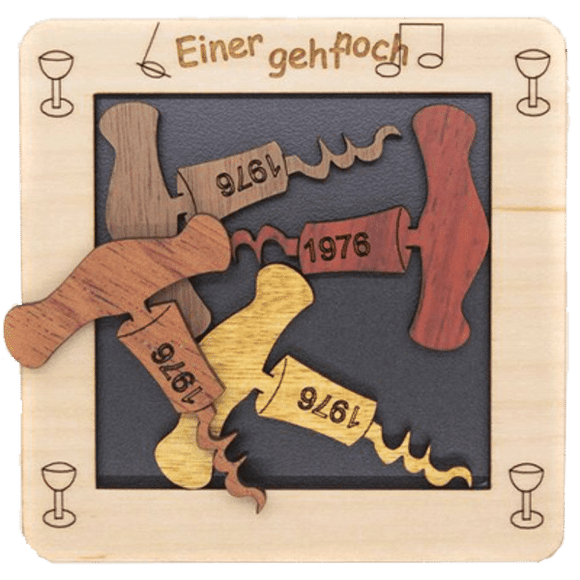 A mechanical puzzle titled 'Einergehtnoch' featuring corkscrew shapes made from different colored wood. The pieces are arranged in a square frame, each labeled with years. The design combines playful and intriguing elements, perfect for puzzle enthusiasts.